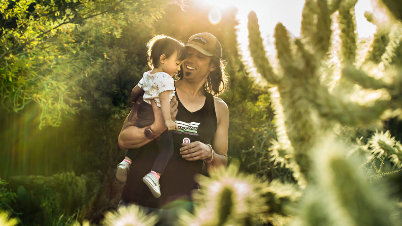 Photograph of guest with child